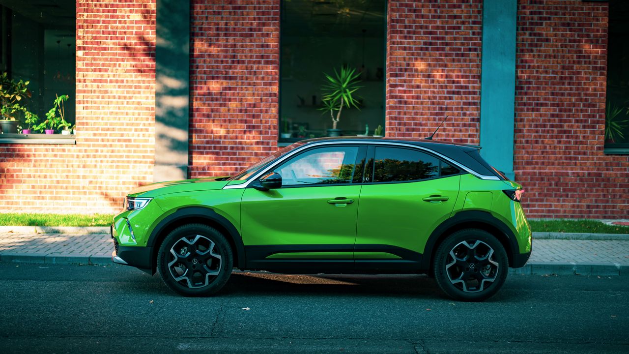 "Overview of Electric Cars: Fuel Economy, Charging Infrastructure, and Range Anxiety"