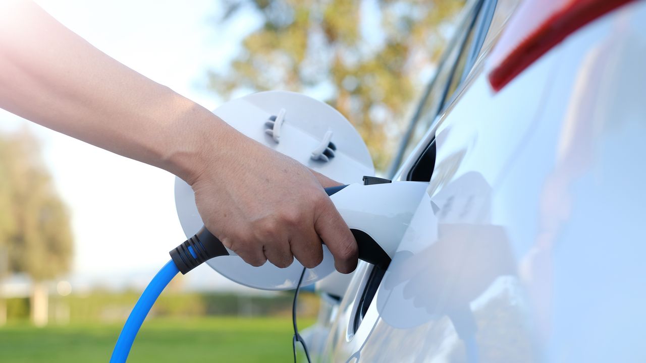 EV Charging Station Scheduling: Enhancing Scalability and User Experience